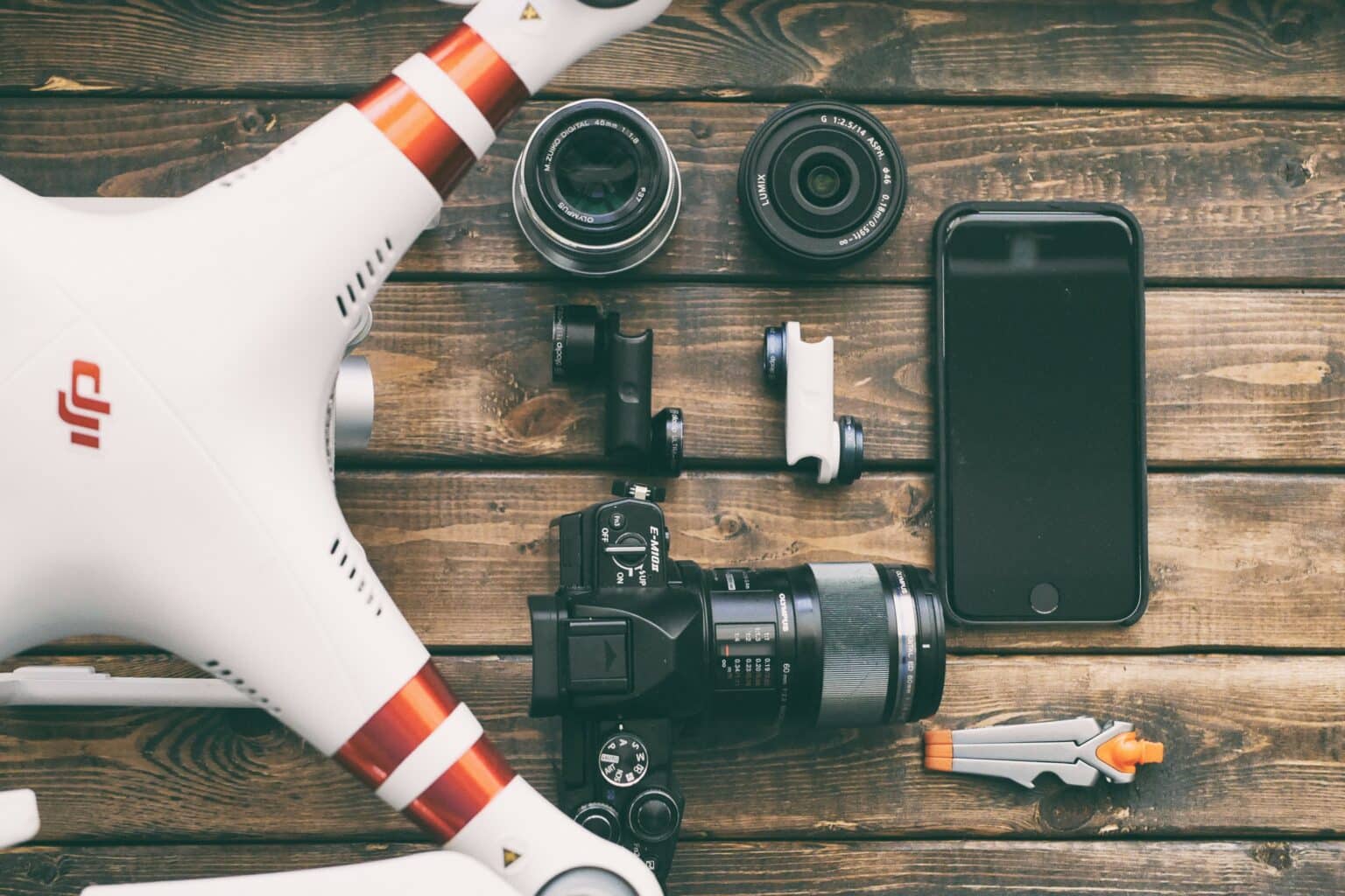 view of drone and camera equipment on table from above