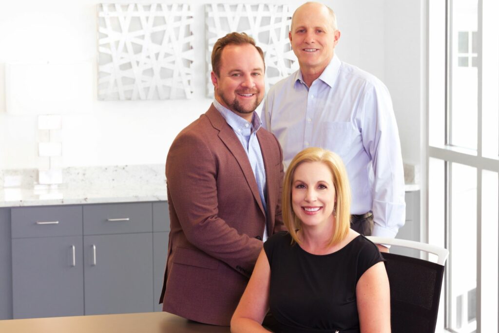 Group photo of InspectorPro Insurance brokers Brianne Smith, Will Colton, and Aaron Menlove.