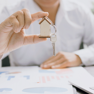 Authorized Agents, represented with image of hand holding a small house figurine