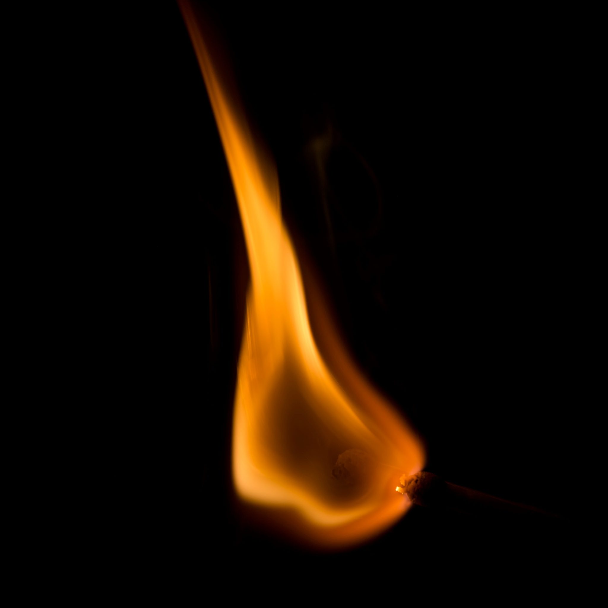 flame against dark background