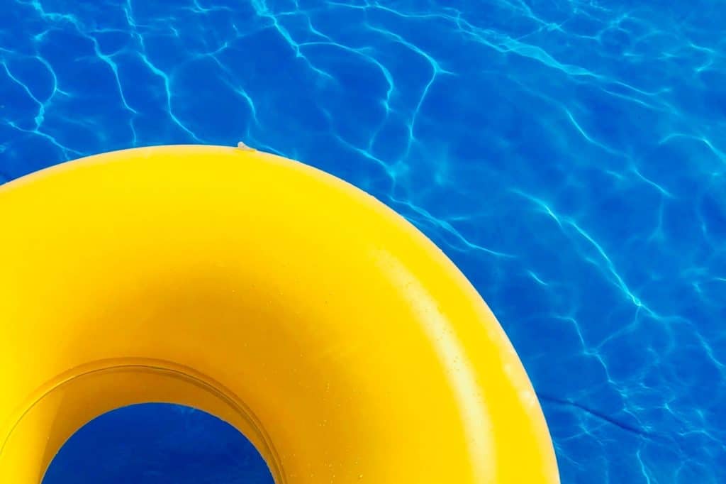 yellow inner tube in pool - pool inspections