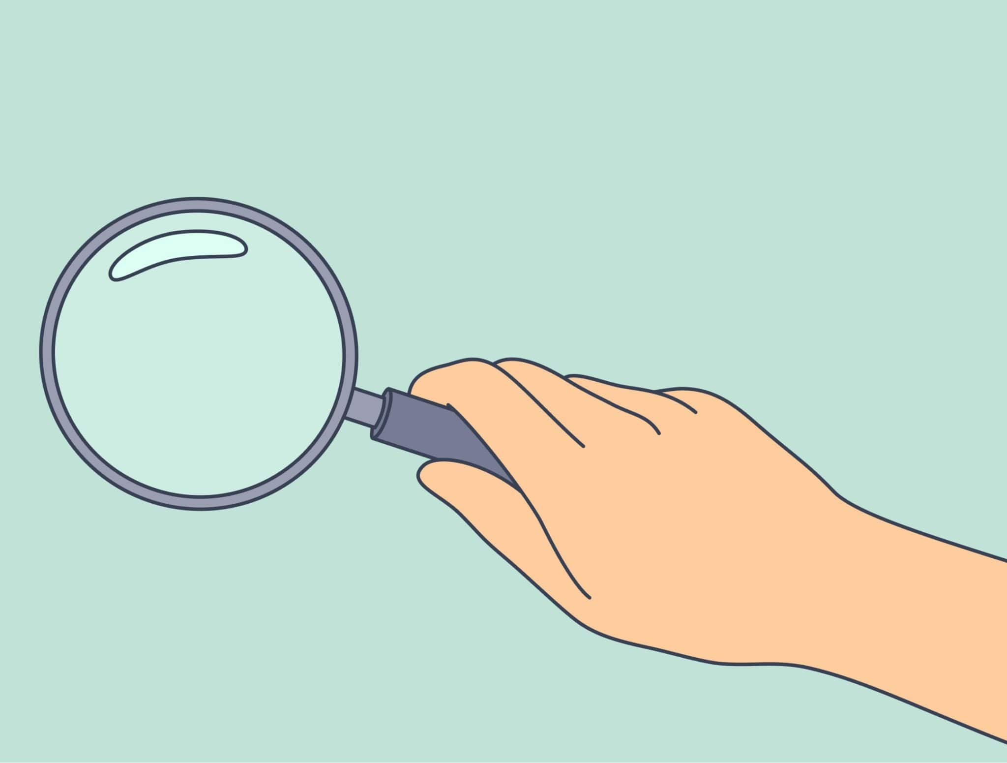 Cartoon of hand holding magnifying glass pointing to left, against mint green background