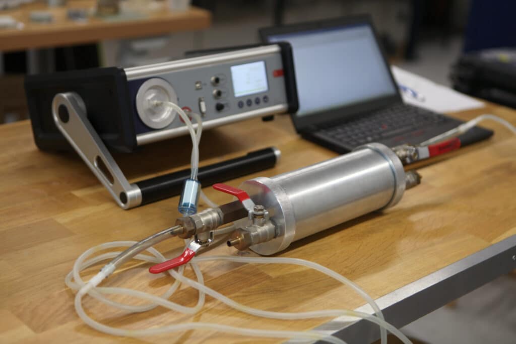 Close-up of radon tester for home inspectors on desk