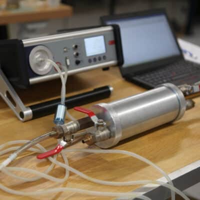 Close-up of radon tester for home inspectors on desk