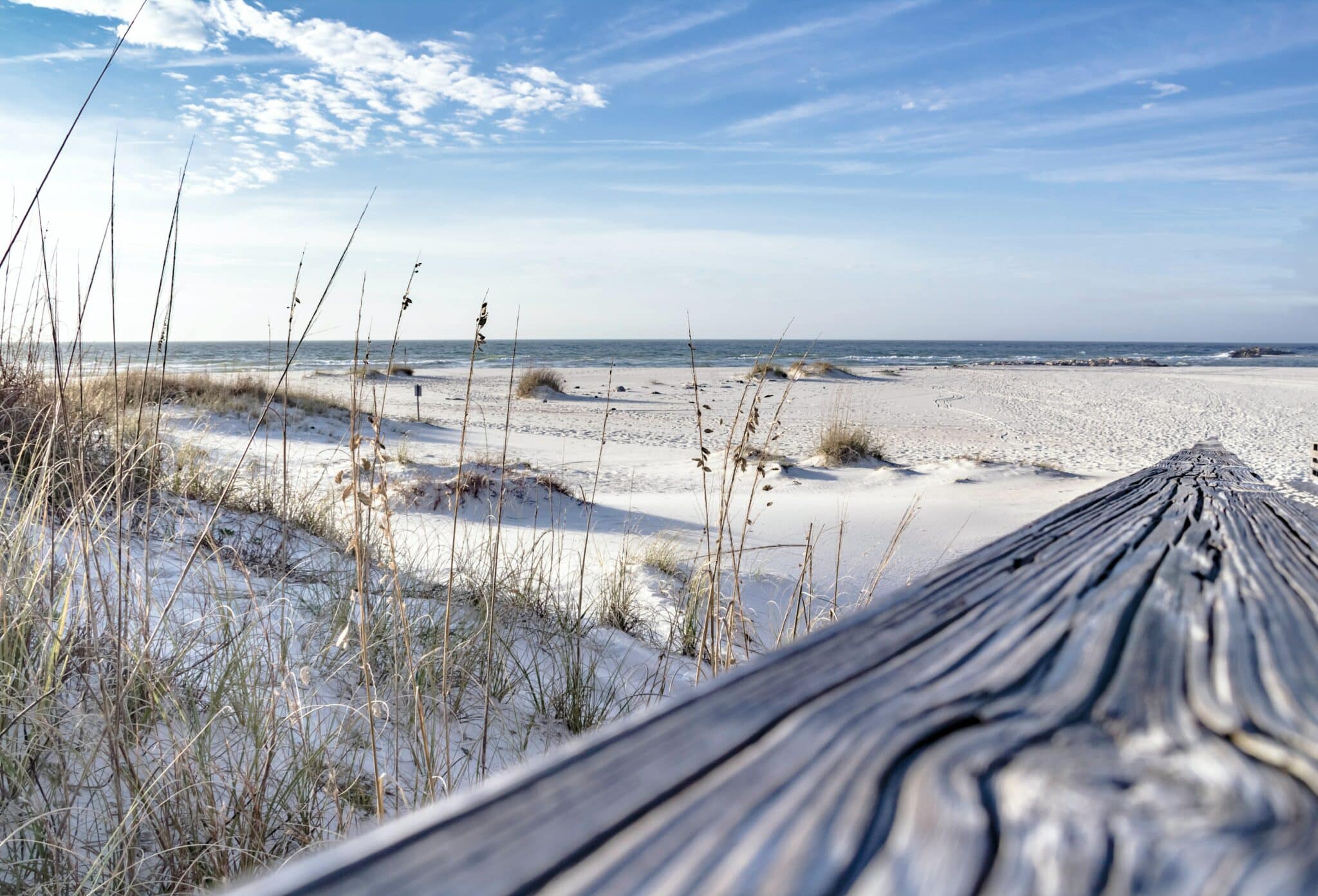 Pass in Orange Beach, Alabama, close to the Gulf Shores. Featuring white sands and a bright, blue sky