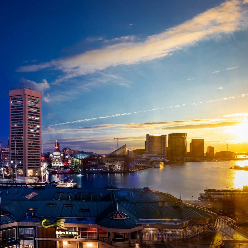 An aerial view of the Baltimore Inner Harbor, Maryland at sunset.