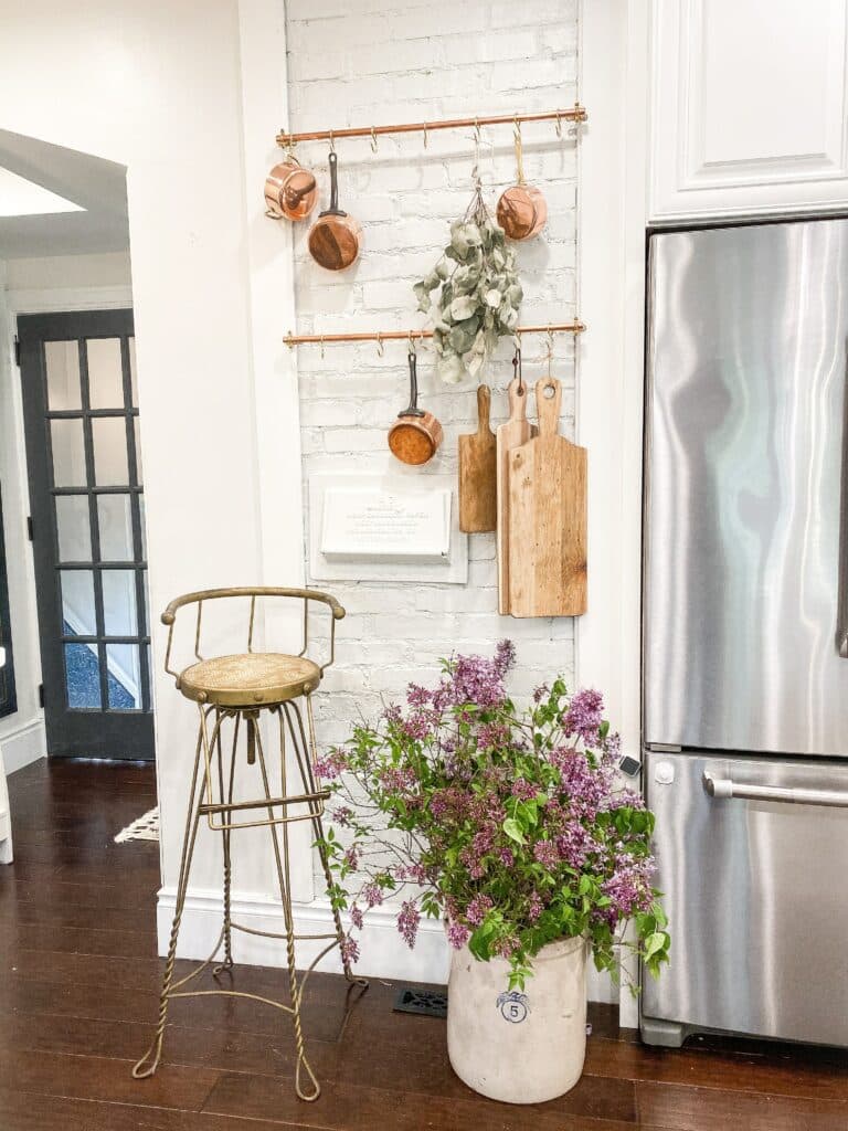 French country decor beside refrigerator